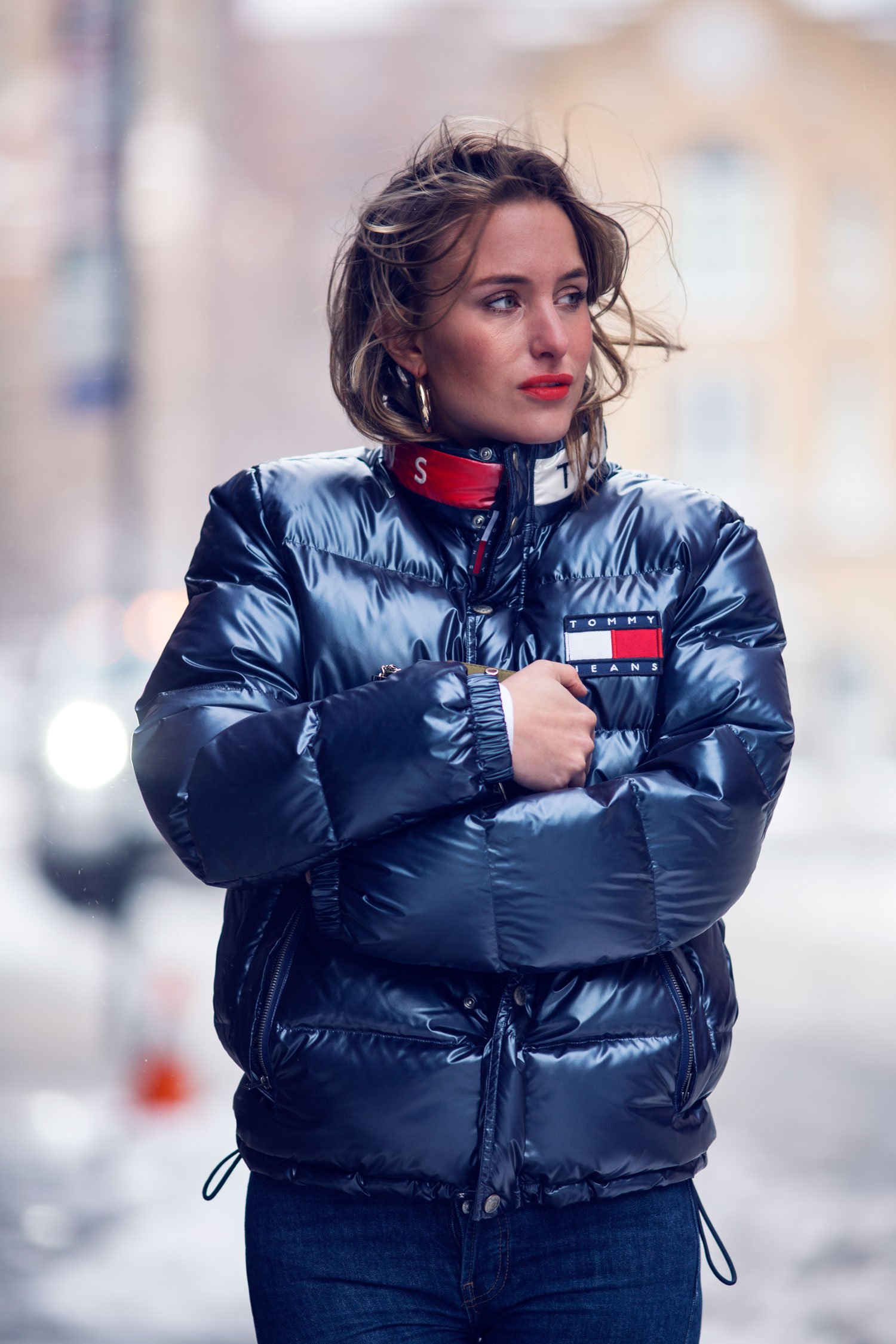 A TOMMY HILFIGER PUFFER COAT IN THE BLIZZARD